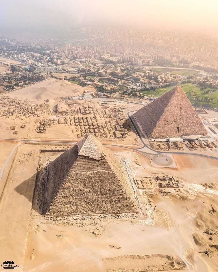 An aerial view of the Great Pyramids in Egypt showing two pyramids.